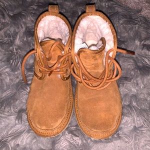 Ugg Children’s boot. Stylish & will keep their little feet warm for winter.